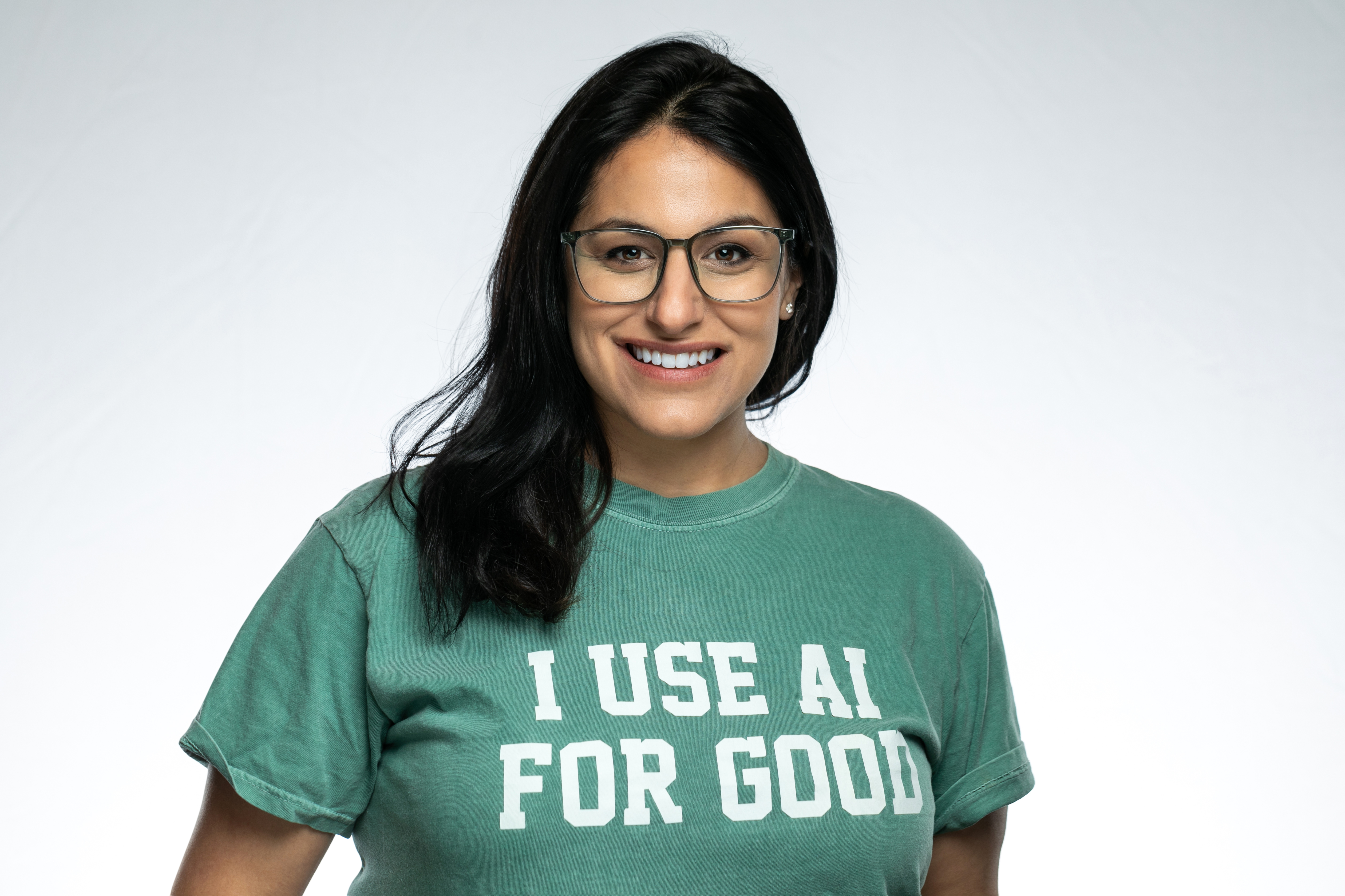 Jenny Cotie Kangas wearing a shirt that reads I use AI for good